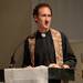 Rev. Ian Reed Twiss, of Holy Faith Church delivers a sermon during a prayer vigil in support of Camp Take Notice at St. Mary Student Parish on Thursday night.  Melanie Maxwell I AnnArbor.com